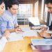 Loan business finance businessman explain business report from data analysis or bank marketing for loan money. Selected focus
