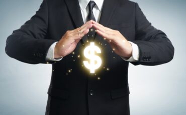 graphicstock-protect-company-finances-and-tax-optimization-company-investment-represented-by-dollar-symbol_SuY7J2vgsg-mentalny Protect company finances and tax optimization, company investment, represented by dollar symbol.