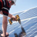 Male,Engineer,In,Protective,Helmet,Installing,Solar,Photovoltaic,Panel,System
